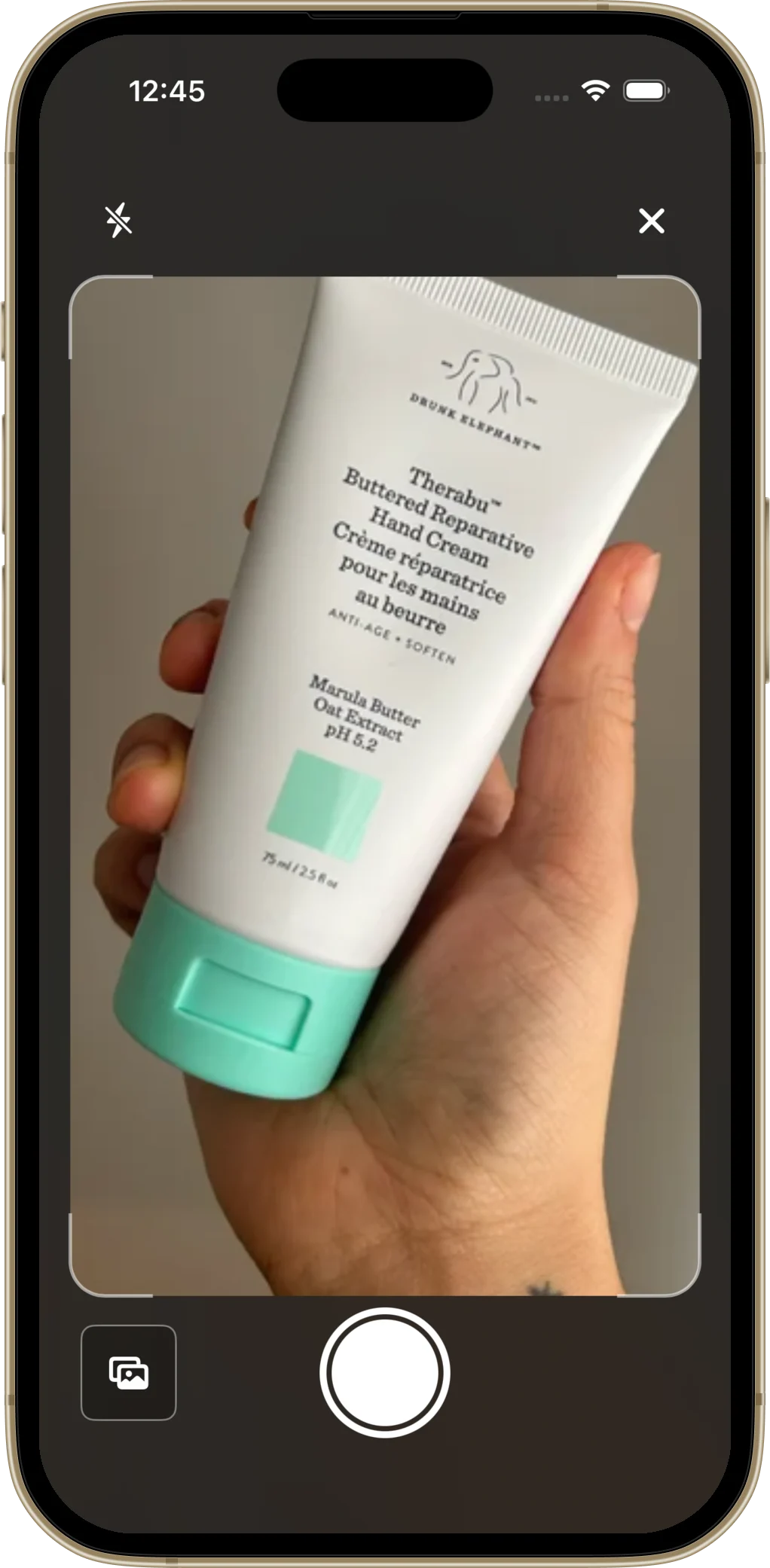 Pristine product scanner framing a bottle of facial oil